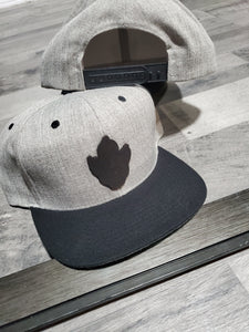 Snap Back Midnight Leather logo